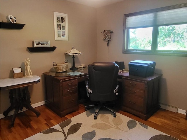 76 Belaire Dr, Big Flats, NY 14845 - office area with wood finished floors, baseboards, and a baseboard radiator