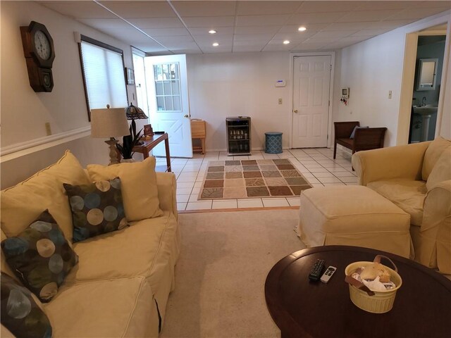 76 Belaire Dr, Big Flats, NY 14845 - living room featuring wine cooler, recessed lighting, tile patterned floors, and a drop ceiling