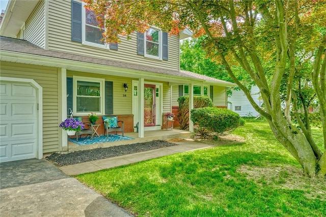 54 Hillary Dr, Chili, NY 14624 - view of front of home with a porch, a front lawn, driveway, roof with shingles, and brick siding