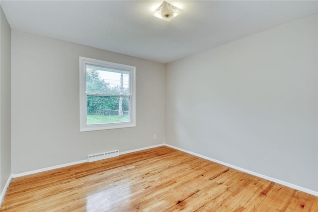 54 Hillary Dr, Chili, NY 14624 - empty room featuring wood finished floors and baseboards