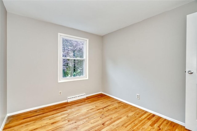 54 Hillary Dr, Chili, NY 14624 - spare room featuring light wood-style flooring and baseboards