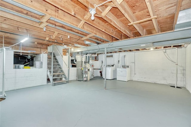 54 Hillary Dr, Chili, NY 14624 - unfinished basement featuring washing machine and dryer, heating unit, and stairway