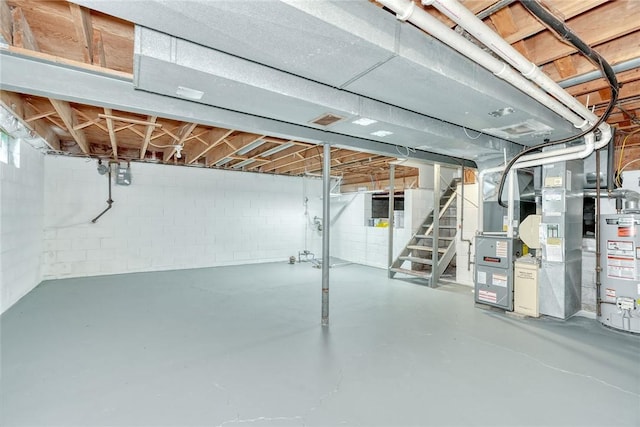 54 Hillary Dr, Chili, NY 14624 - unfinished below grade area featuring water heater, stairs, and heating unit
