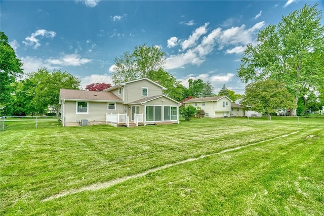 54 Hillary Dr, Chili, NY 14624 - back of house with a sunroom, a wooden deck, and cooling unit