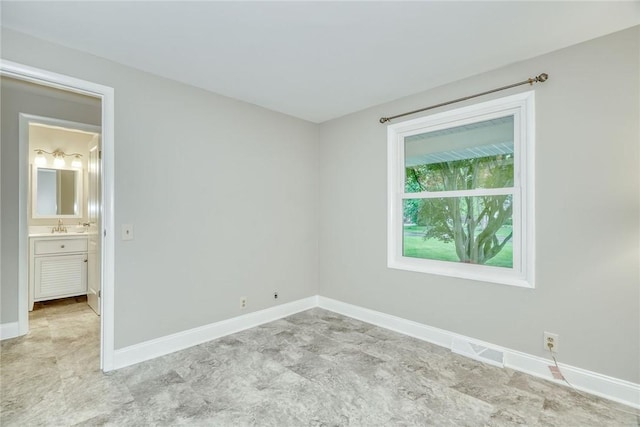 54 Hillary Dr, Chili, NY 14624 - unfurnished room featuring baseboards and a sink