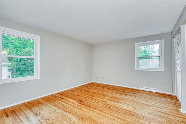 54 Hillary Dr, Chili, NY 14624 - unfurnished room with light wood-type flooring and baseboards