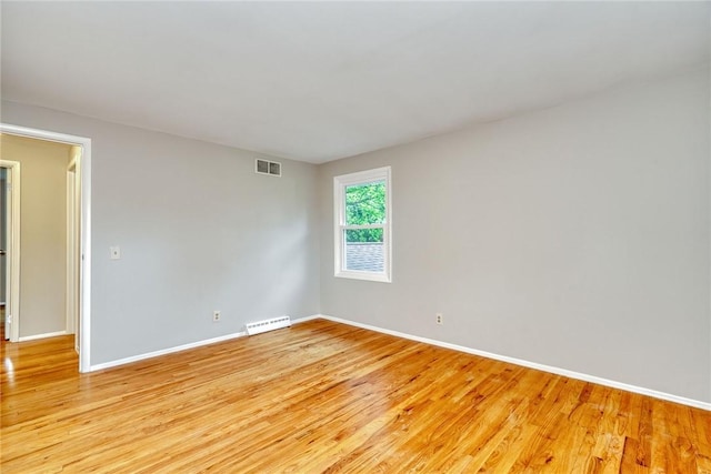 54 Hillary Dr, Chili, NY 14624 - unfurnished room with light wood finished floors and baseboards