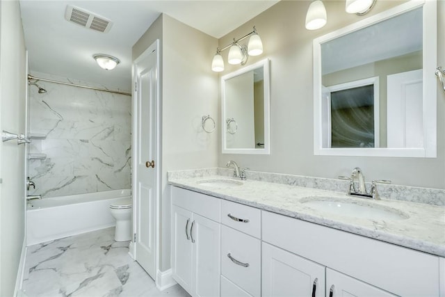54 Hillary Dr, Chili, NY 14624 - bathroom featuring double vanity, marble finish flooring, toilet,  shower combination, and baseboards