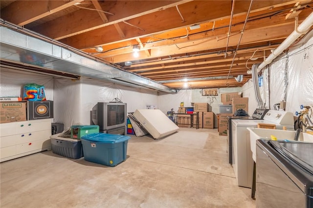 286 Troup St, Rochester, NY 14608 - unfinished basement with washing machine and clothes dryer