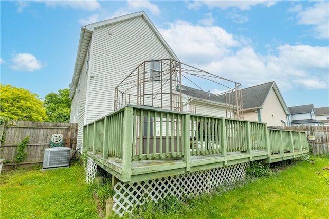 286 Troup St, Rochester, NY 14608 - rear view of house with central AC and a wooden deck