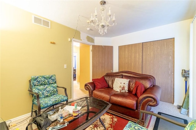 286 Troup St, Rochester, NY 14608 - living area with a chandelier and baseboards