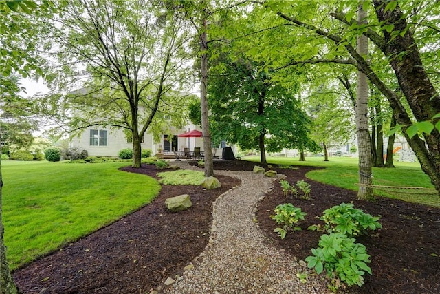 863 Rolins Run, Webster, NY 14580 - view of green lawn featuring a patio area