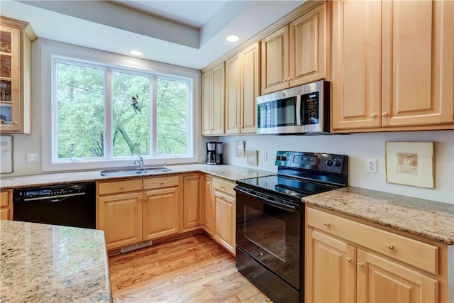 863 Rolins Run, Webster, NY 14580 - kitchen featuring black appliances, a sink, plenty of natural light, light brown cabinetry, and recessed lighting