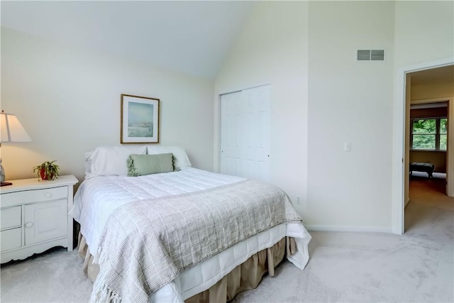 863 Rolins Run, Webster, NY 14580 - bedroom featuring light carpet, vaulted ceiling, a closet, and baseboards