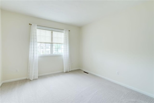 863 Rolins Run, Webster, NY 14580 - empty room with carpet flooring and baseboards