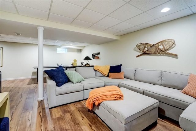 863 Rolins Run, Webster, NY 14580 - living room with a drop ceiling and wood finished floors
