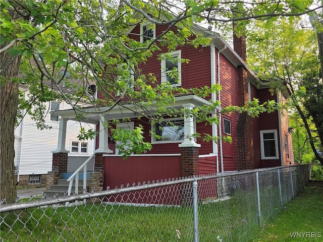 1618 16th St, Niagara Falls, NY 14305 - view of front of home with a chimney and entry steps