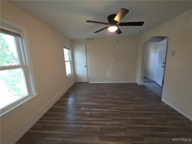 1618 16th St, Niagara Falls, NY 14305 - unfurnished room with plenty of natural light, baseboards, and arched walkways