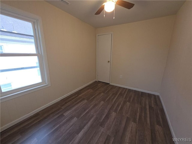 1618 16th St, Niagara Falls, NY 14305 - unfurnished room with wood finished floors, plenty of natural light, baseboards, and ceiling fan