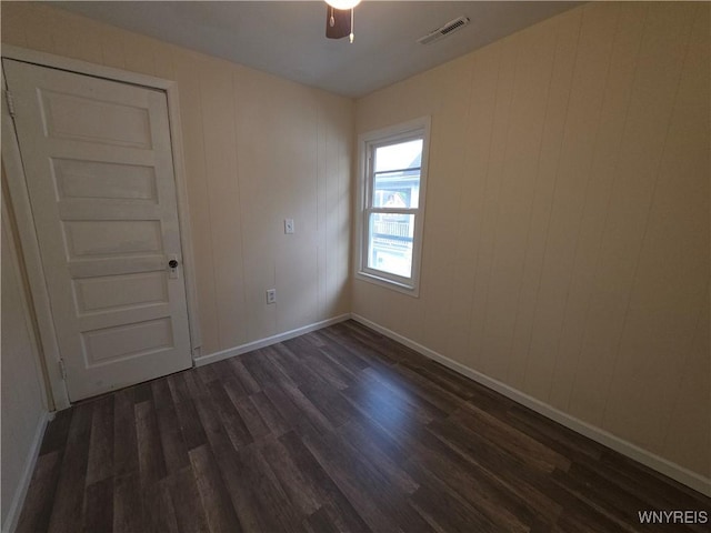 1618 16th St, Niagara Falls, NY 14305 - spare room featuring dark wood-type flooring and baseboards