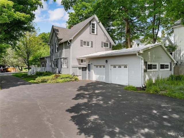 53 University Ave, Hamilton, NY 13346 - view of front facade featuring asphalt driveway