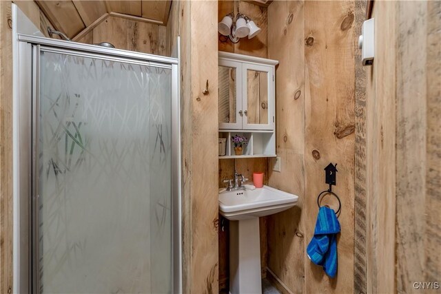 6372 George Hill Rd, Watson, NY 13343 - bathroom featuring a shower stall and a sink