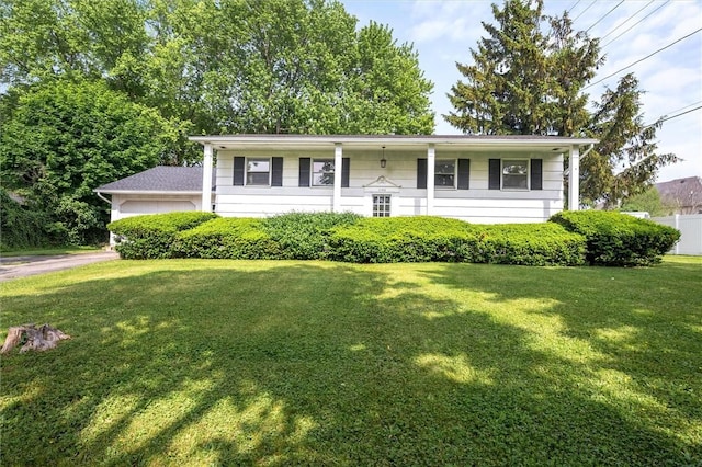1156 Hatch Rd, Webster, NY 14580 - view of front of house featuring a front lawn and a garage