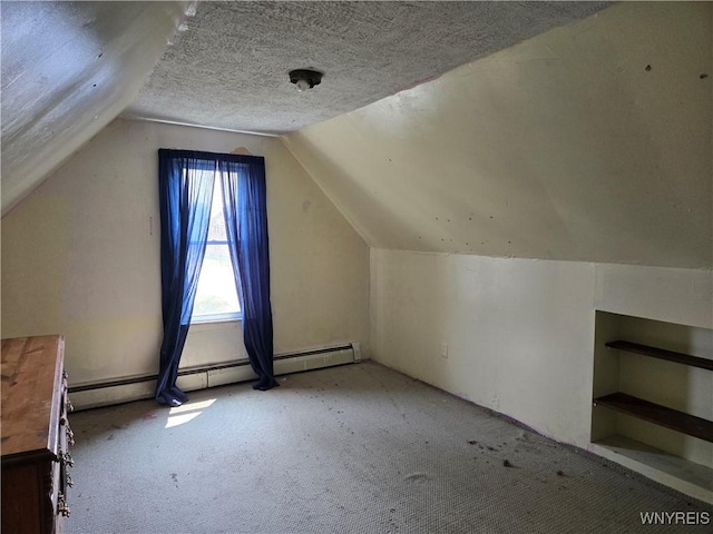 465 Willett St, Buffalo, NY 14206 - bonus room with carpet, lofted ceiling, and a baseboard heating unit