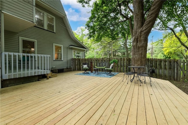40 Washington Rd, Pittsford, NY 14534 - wooden deck with a fenced backyard and outdoor dining area