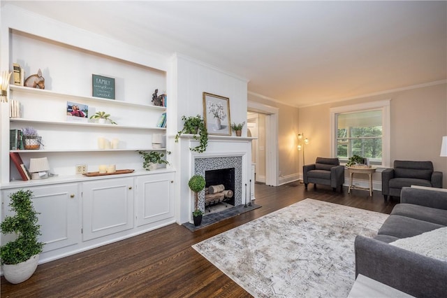 40 Washington Rd, Pittsford, NY 14534 - living room featuring dark wood finished floors, a tile fireplace, and ornamental molding