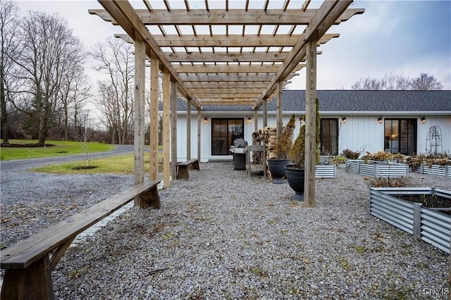 4500 W Lake Rd, Niles, NY 13152 - view of patio / terrace featuring a garden, a pergola, and a grill