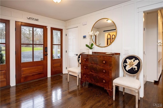 4500 W Lake Rd, Niles, NY 13152 - foyer with wood finished floors and a decorative wall