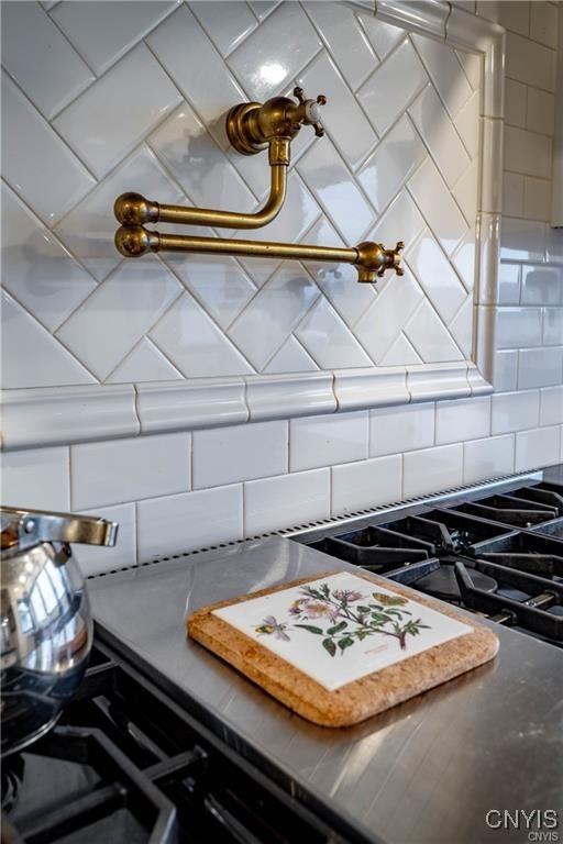 4500 W Lake Rd, Niles, NY 13152 - kitchen view of tasteful backsplash and pot filler