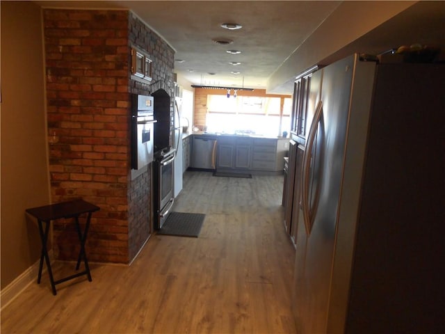 4700 W Lake Rd, Fleming, NY 13021 - kitchen with stainless steel appliances and light wood-type flooring