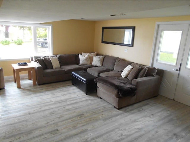 4700 W Lake Rd, Fleming, NY 13021 - living room featuring wood finished floors and healthy amount of natural light