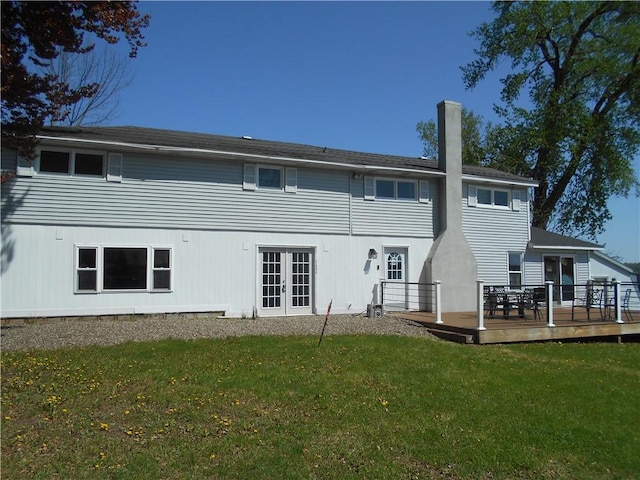 4700 W Lake Rd, Fleming, NY 13021 - back of property featuring french doors, a wooden deck, a chimney, and a yard