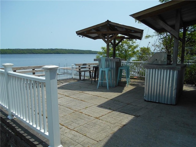 4700 W Lake Rd, Fleming, NY 13021 - view of patio featuring a water view