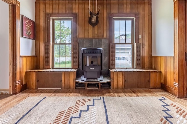 39 Middle St, Hancock, NY 13756 - detailed view of a wood stove, wood finished floors, and wood walls