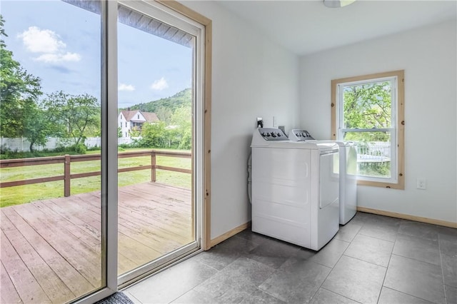 39 Middle St, Hancock, NY 13756 - washroom with washing machine and clothes dryer, baseboards, and tile patterned flooring