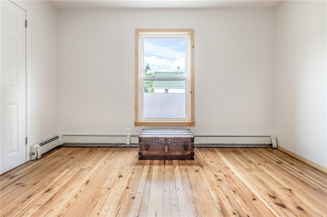 39 Middle St, Hancock, NY 13756 - spare room with a baseboard radiator and hardwood / wood-style floors