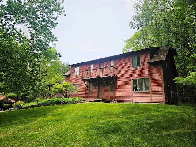 139 Pheasant Run Rd, Middlefield, NY 13326 - rear view of house with a balcony and a lawn