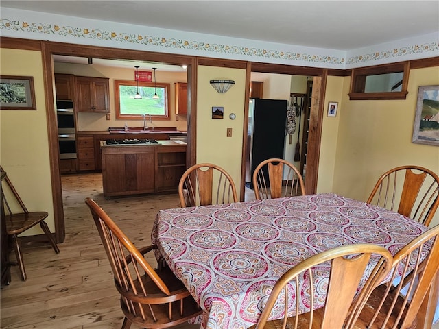 139 Pheasant Run Rd, Middlefield, NY 13326 - dining area featuring light wood-type flooring