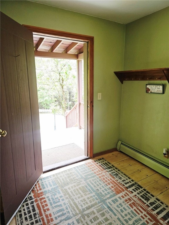 139 Pheasant Run Rd, Middlefield, NY 13326 - doorway to outside featuring hardwood / wood-style flooring and baseboards