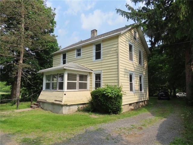6018 Dunning Ave, Fleming, NY 13021 - view of front of property featuring a chimney, a front yard, and crawl space