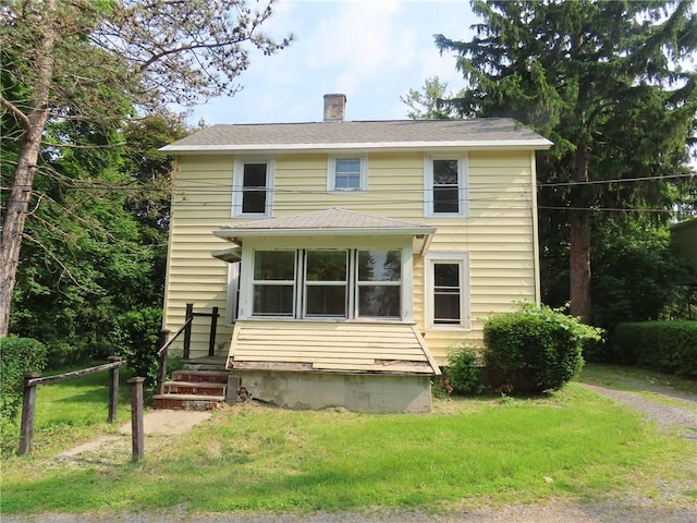 6018 Dunning Ave, Fleming, NY 13021 - view of front of property with a chimney and a front lawn