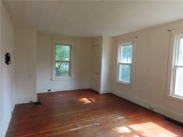 6018 Dunning Ave, Fleming, NY 13021 - empty room featuring wood-type flooring and healthy amount of natural light