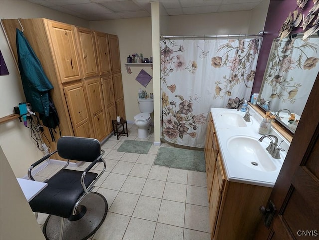 2976 Cataract St, Denmark, NY 13626 - bathroom with tile patterned flooring, double vanity, a paneled ceiling, toilet, and a shower with shower curtain