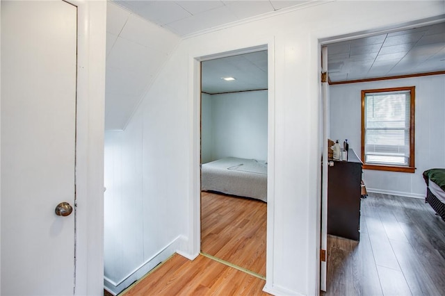 239 Weyl, Rochester, NY 14621 - hallway with ornamental molding, wood finished floors, baseboards, and vaulted ceiling
