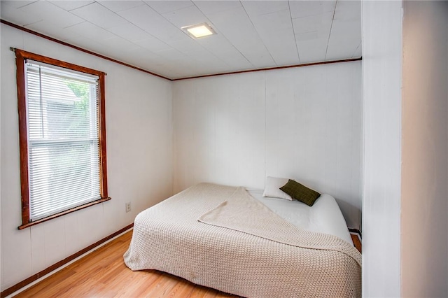 239 Weyl, Rochester, NY 14621 - bedroom featuring wood finished floors, crown molding, and baseboards
