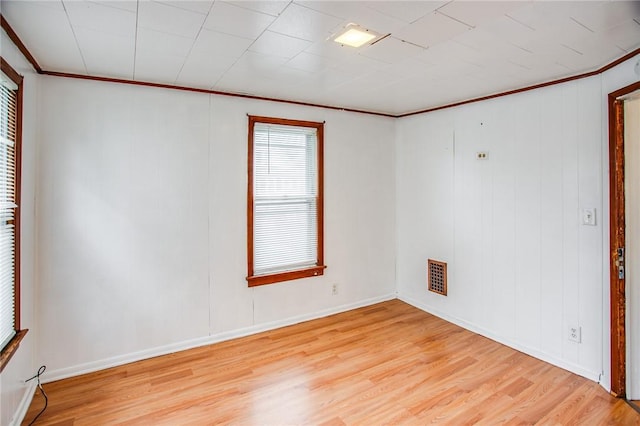 239 Weyl, Rochester, NY 14621 - empty room with light wood-style flooring, crown molding, and baseboards